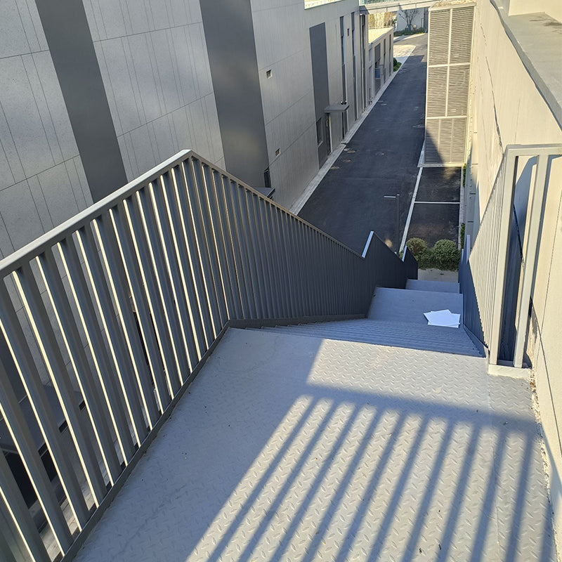 Evacuation channel steel staircase Building attic with steel structure stairs and stairs