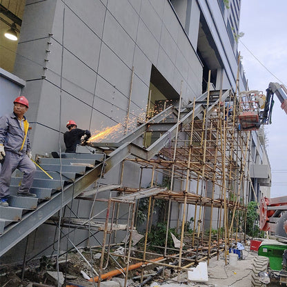 Evacuation channel steel staircase Building attic with steel structure stairs and stairs